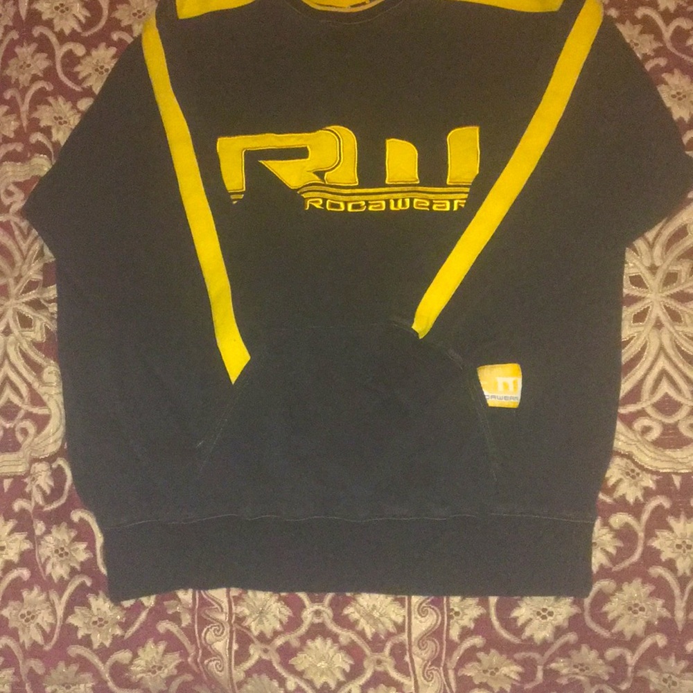 Blue and yellow old school ROCAWEAR sweater xl size large RW ANDsymbol on front